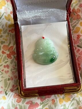 Light green jade Buddha charm
